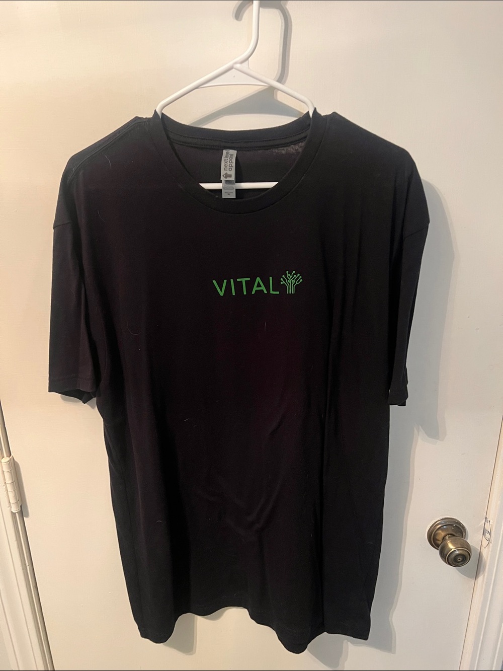 Next Level Apparel Black T‑Shirt with Green VITAL Logo
